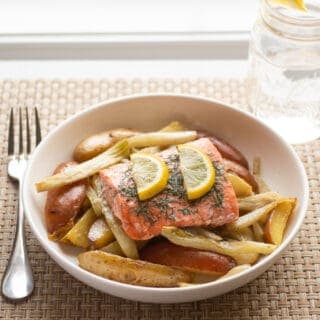 Salmon on top of roasted potatoes and fennel