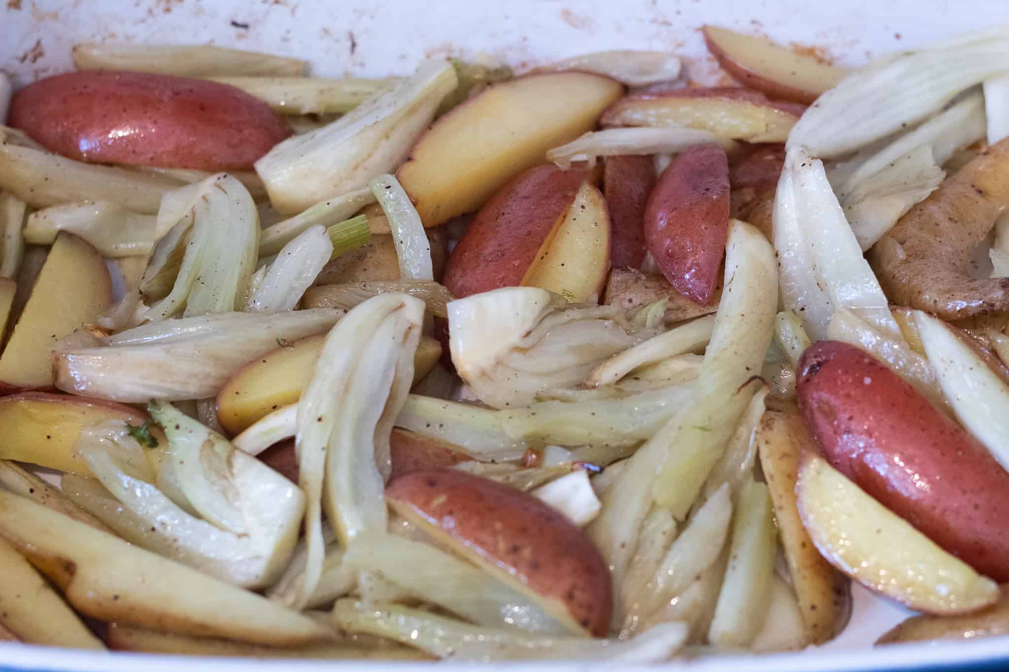 Baking dish with roasted fennel and potatoes