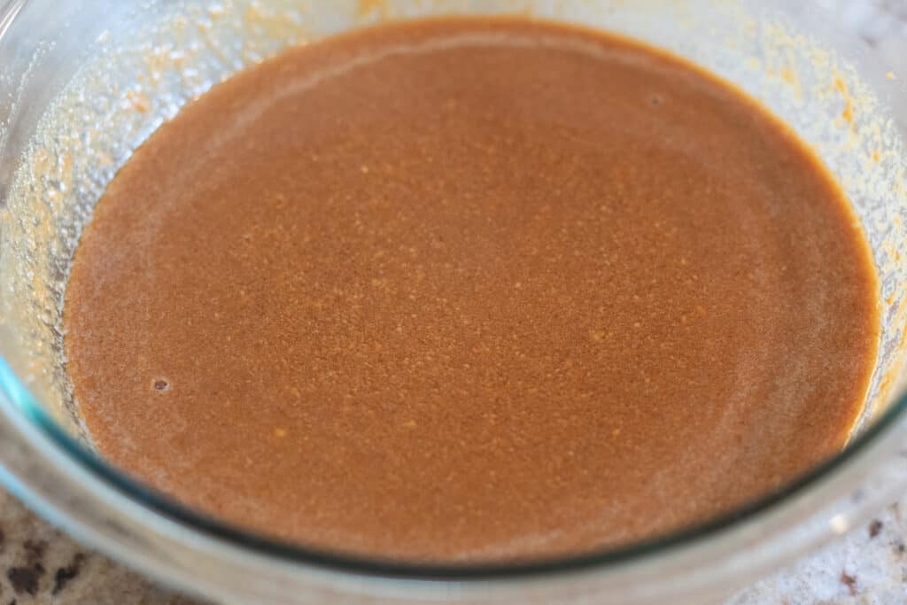 Up close bowl of peanut sauce.