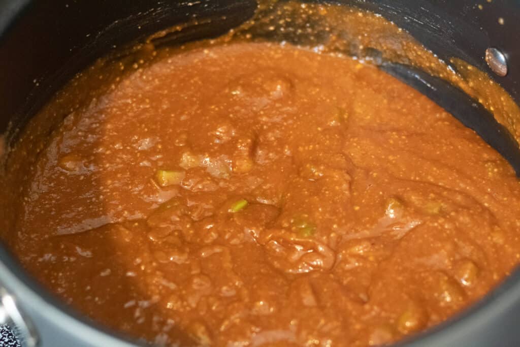 Cooked peanut sauce in the pan.