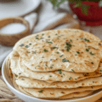 Stack of Flatbreads topped with chopped parsley
