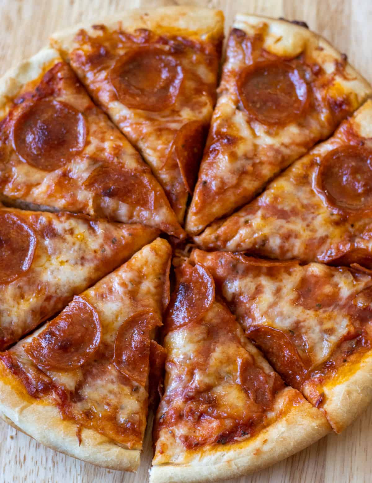 Pepperoni pizza cut into slices.