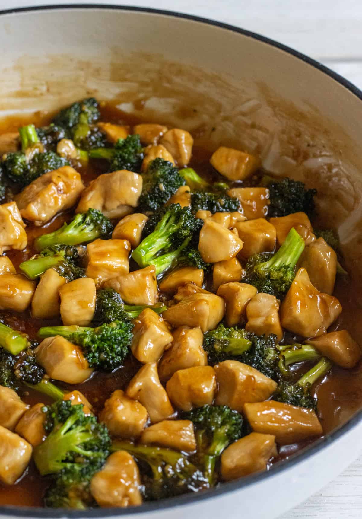 Up close shot of honey garlic chicken stir fry and broccoli.