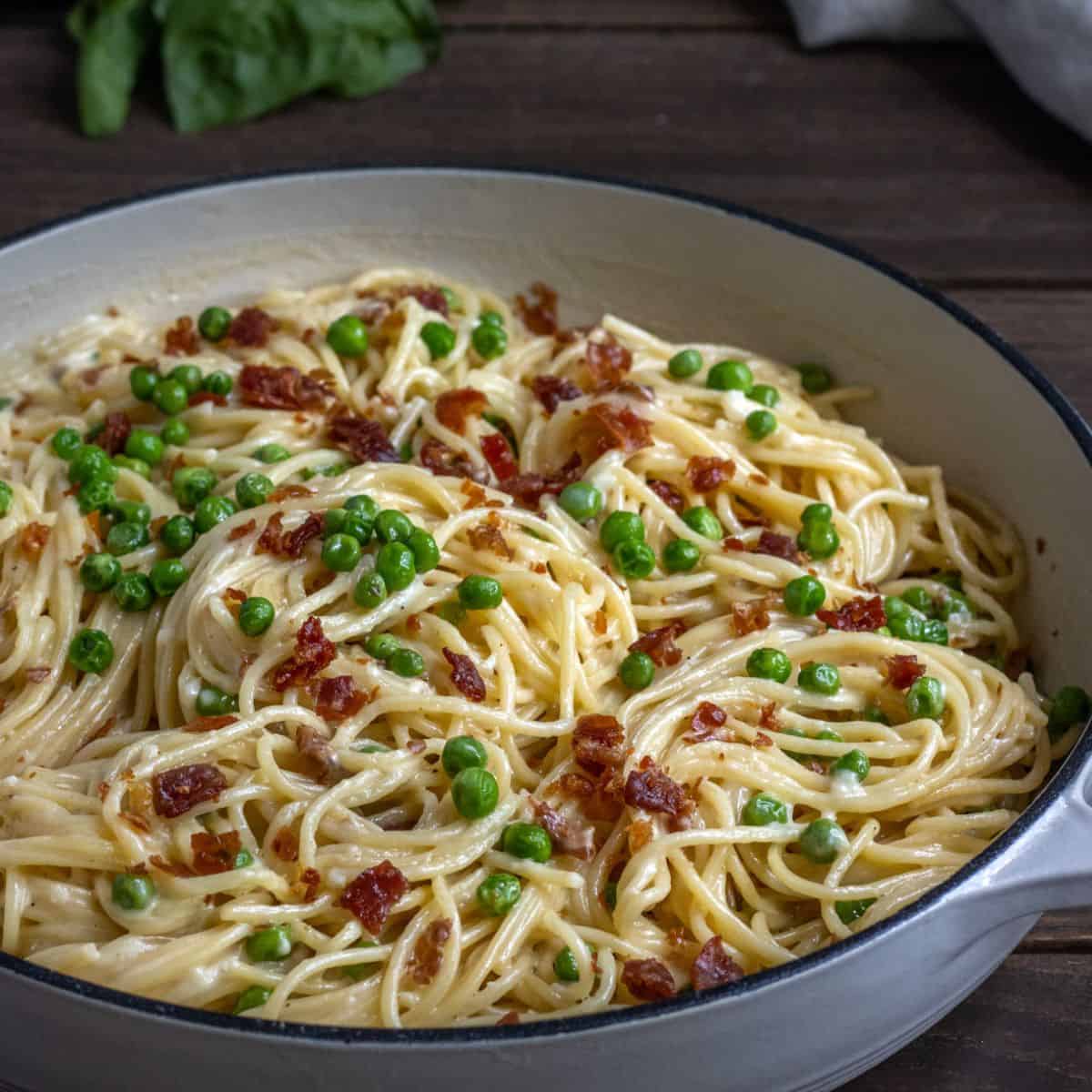 Spaghetti Alfredo with Crispy Prosciutto and Peas