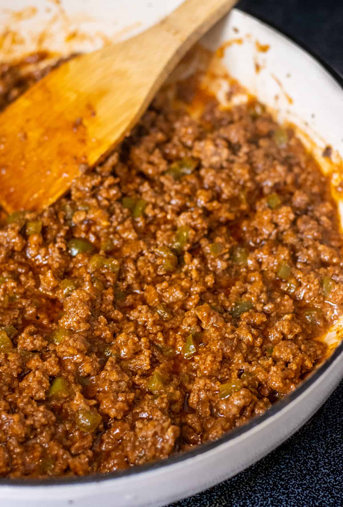 Sloppy Joe meat simmering in a skillet.