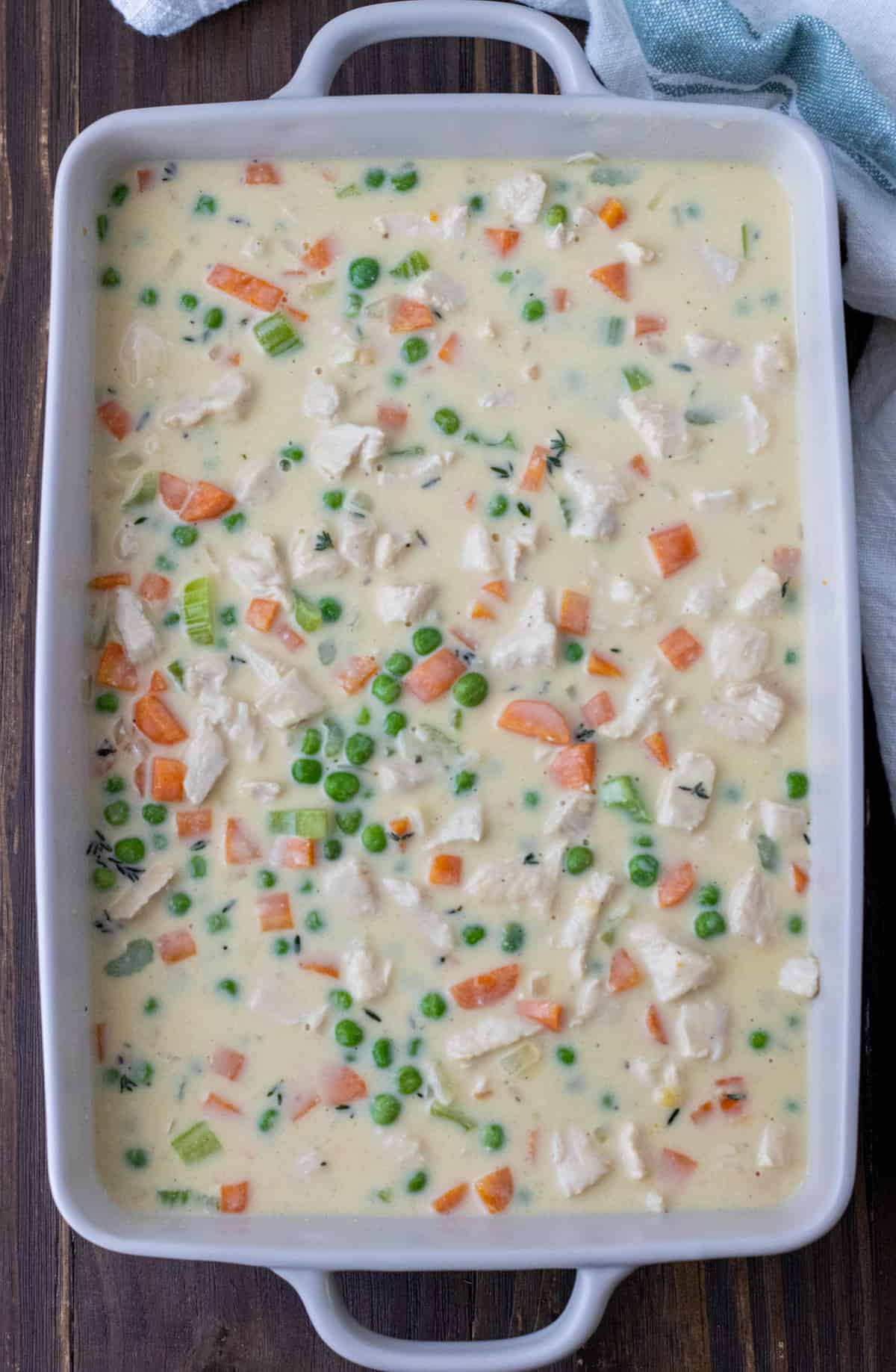 Chicken pot pie filling in a 9x13 baking dish without the puff pastry topping.