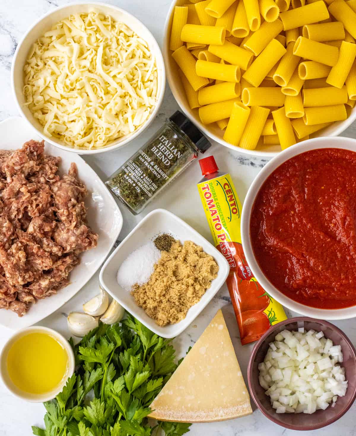 Ingredients for baked rigatoni with sausage.