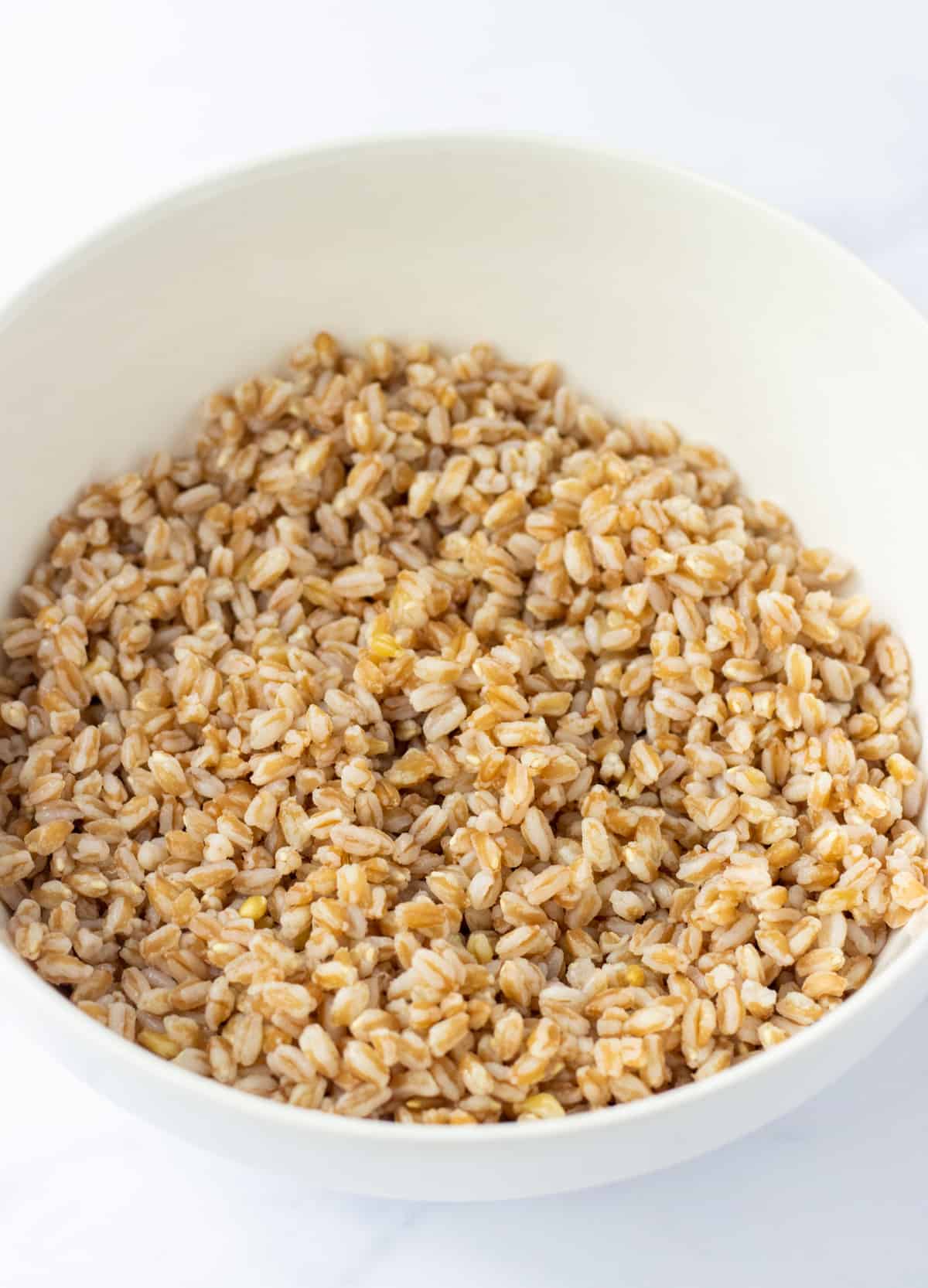 Cooked farro in a bowl.
