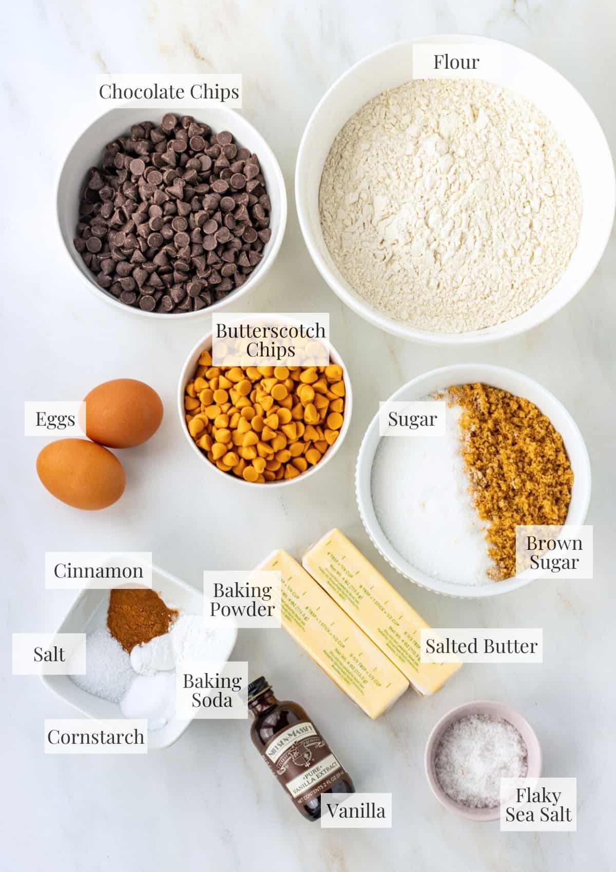 Ingredients for butterscotch chocolate chip cookies with labels.